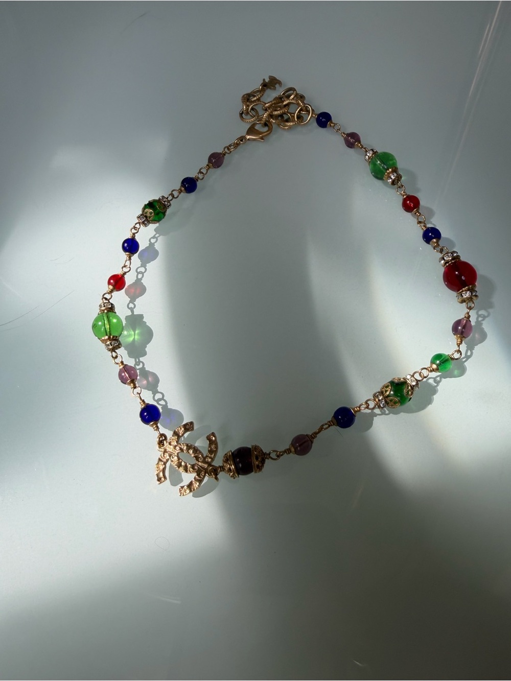 CHANEL Gold-Tone Multicolor Beaded Necklace with Interlocking CC Charm